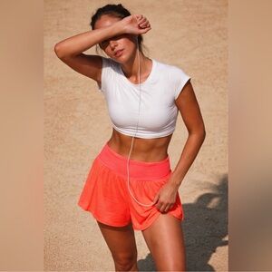 Free People Tempo Light as Air Run Shorts Orange sz M NWOT